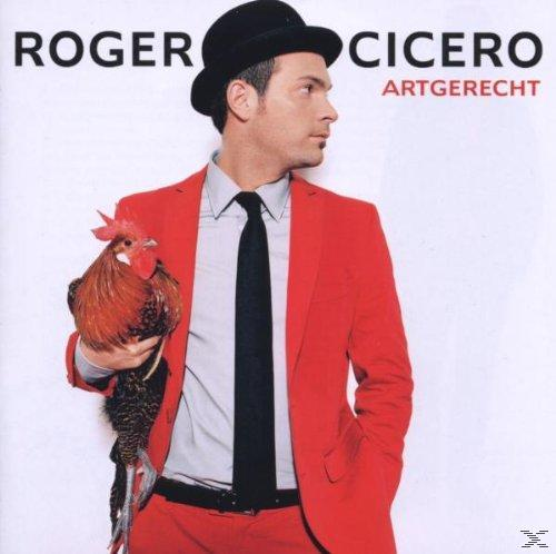 Mann im roten Anzug, Hut und Krawatte hält einen Hahn. Albumcover mit Text 'ROGER CICERO' und 'ARTGERECHT'.