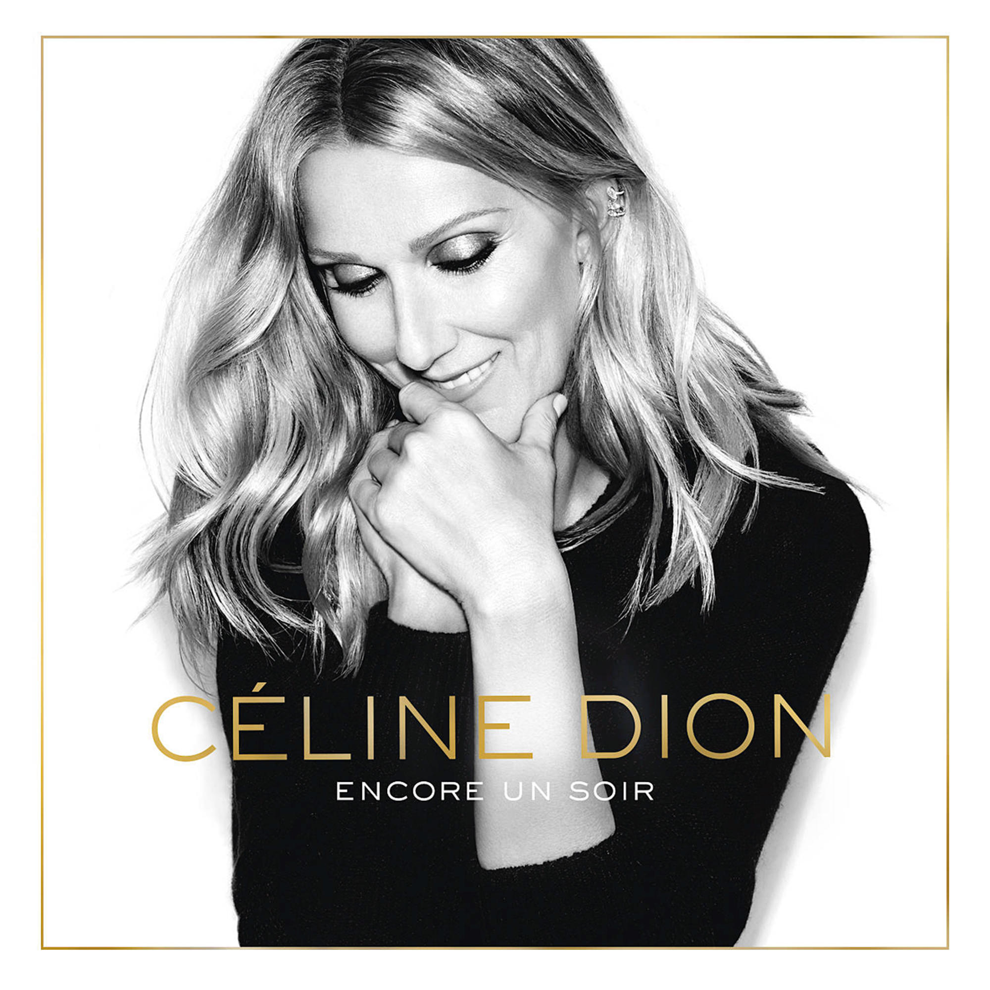 Celine Dion album borítója. Fekete-fehérben van, és mosolyog.