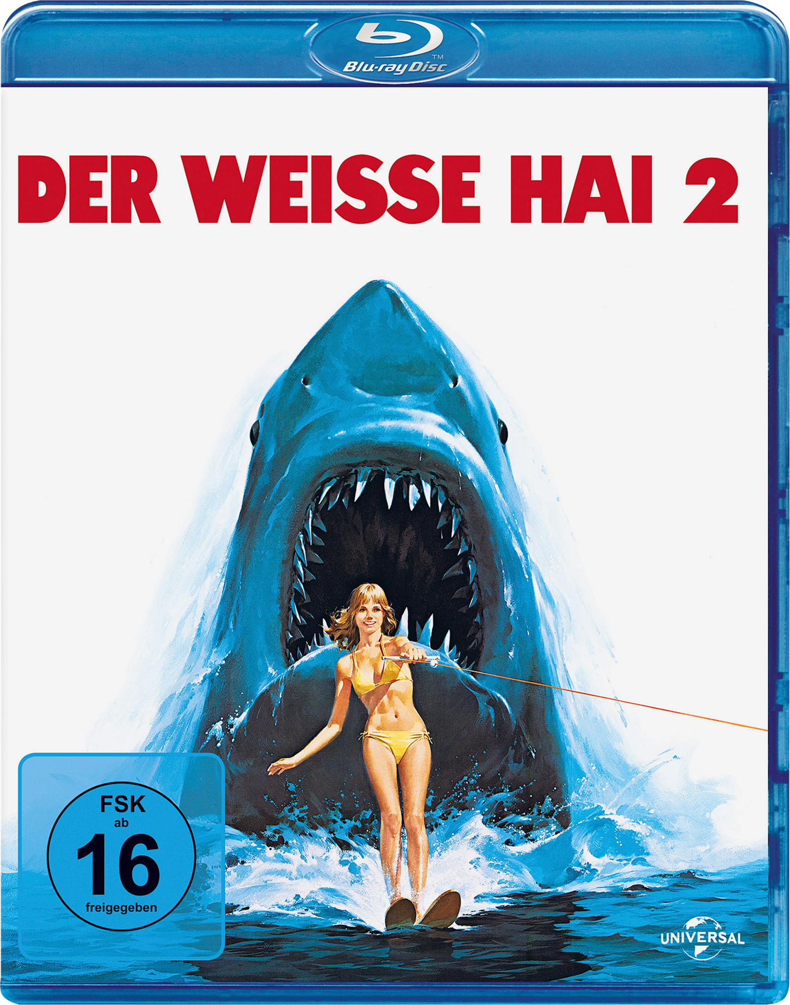 Filmcover eines Hais mit offenem Maul, eine Frau im Bikini auf Wasserski. 'Der Weisse Hai 2'.