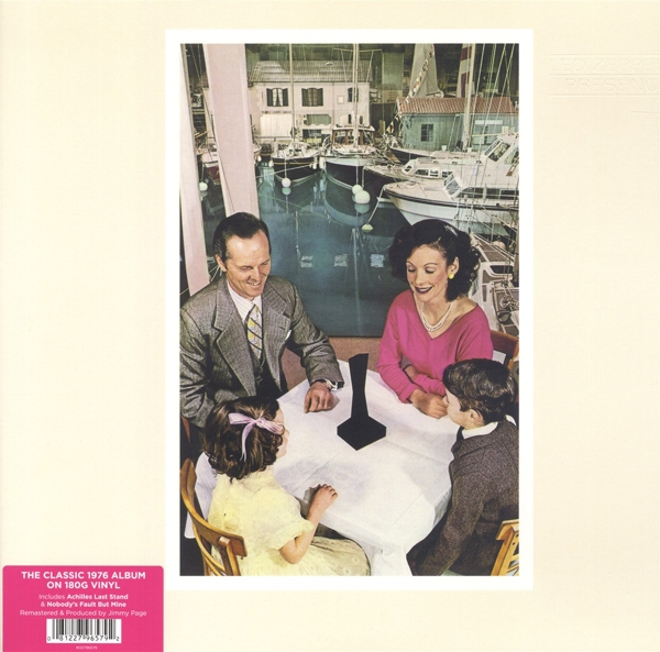 Albumcover mit einer Familie an einem Tisch, mit einer Strandszene im Hintergrund.