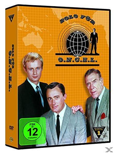 DVD-Hülle mit drei Männern, einem Globus und Text. Mit einem grünen Bewertungsetikett.