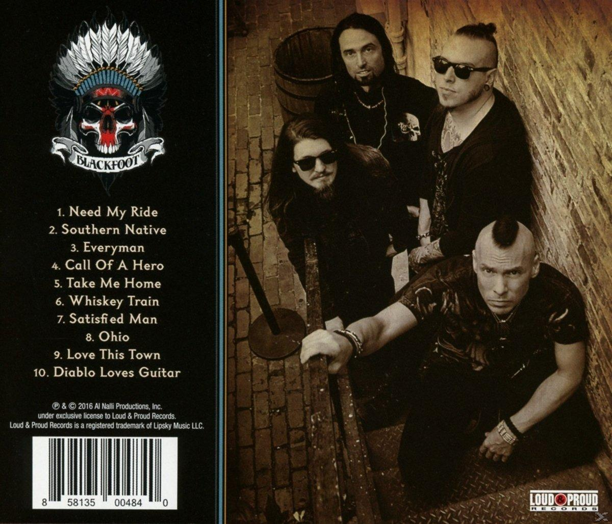 Albumcover mit Bandfoto und Titelliste.