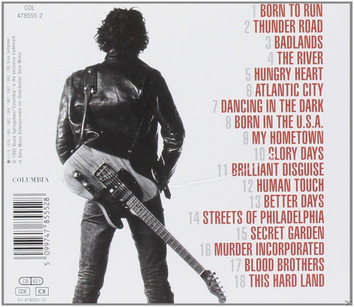 Albumcover mit einem Mann, der eine Gitarre hält. Enthält die Titelliste des Albums.