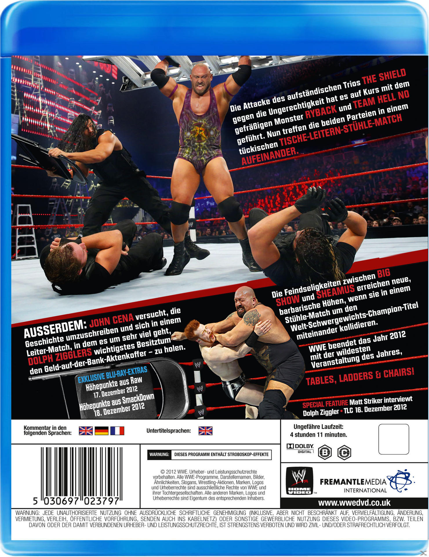 Wrestling-DVD-Cover. Wrestler im Ring. Text auf dem Cover erwähnt Matches und Sonderausstattungen.