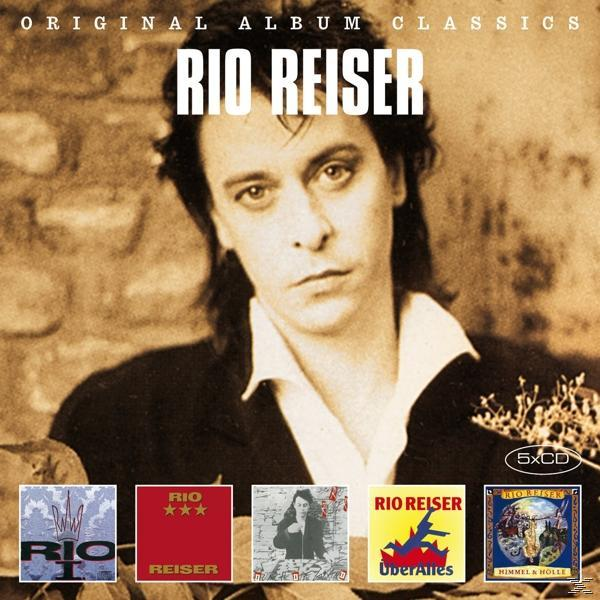 Albumcover mit einem Mann mit langen Haaren, mit dem Text "Rio Reiser" oben.