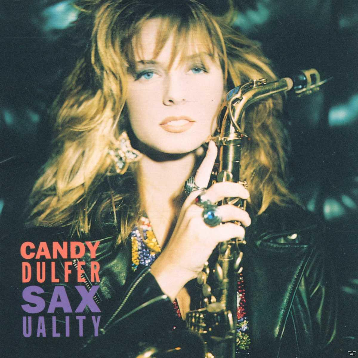 Candy Dulfer hält ein Saxophon. Blonde Frau in Lederjacke. Albumcover.