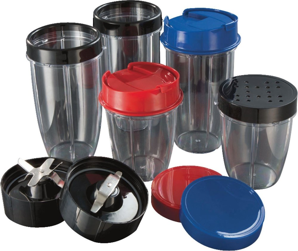 Several blender cups and lids. Various colors. Blades and other components are shown.