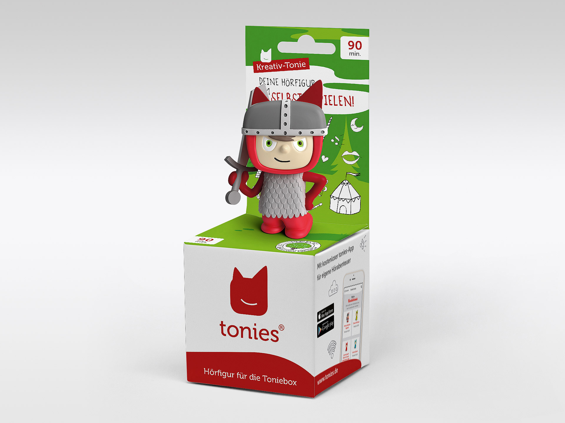 Ein Tonies-Spielzeug in einer Box, eine Ritterfigur und anderes Spielzeug.
