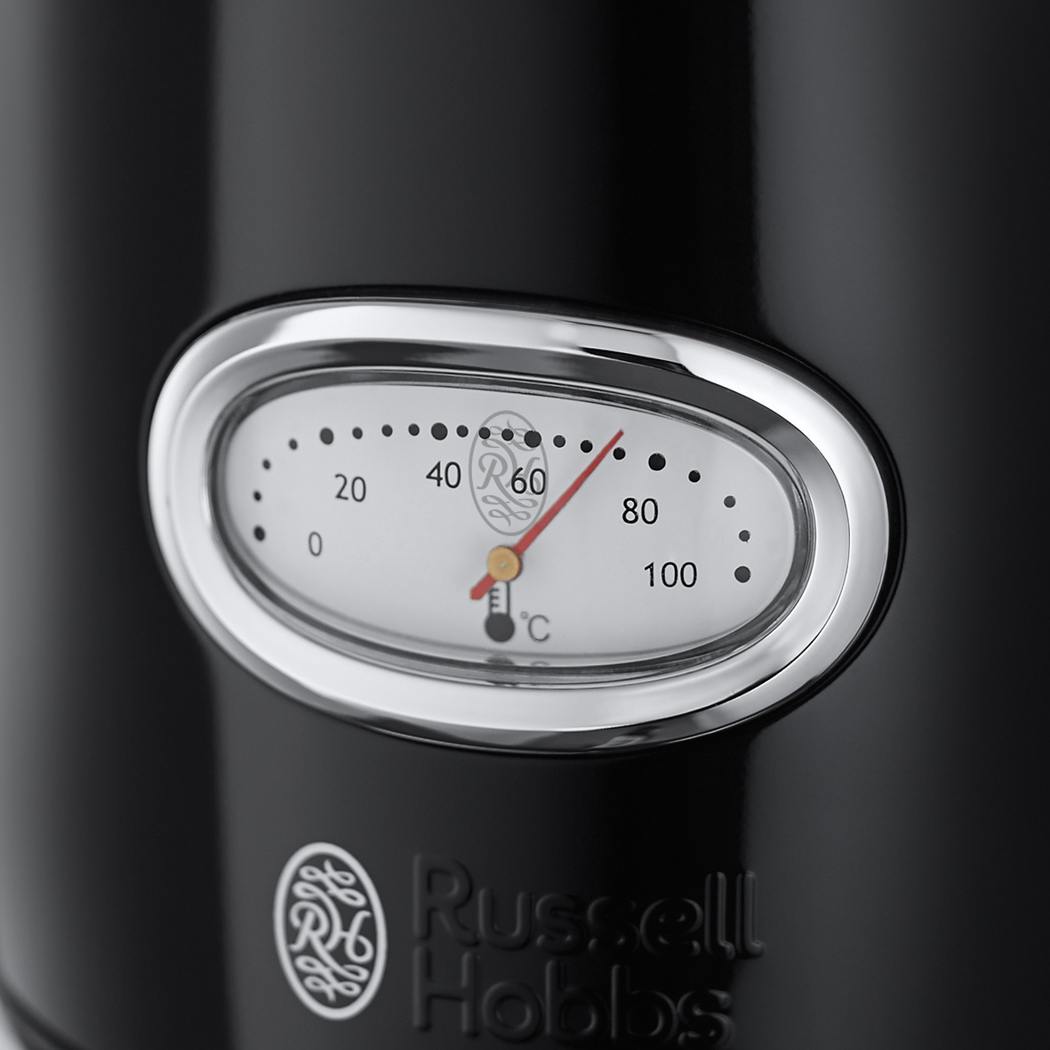 Close-up of a black kettle with a temperature gauge showing 60°C and the Russell Hobbs logo at the bottom.