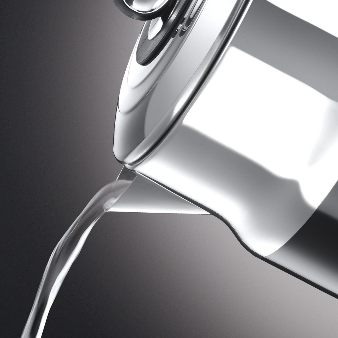 Water pouring from a silver can, clear stream against a dark background.