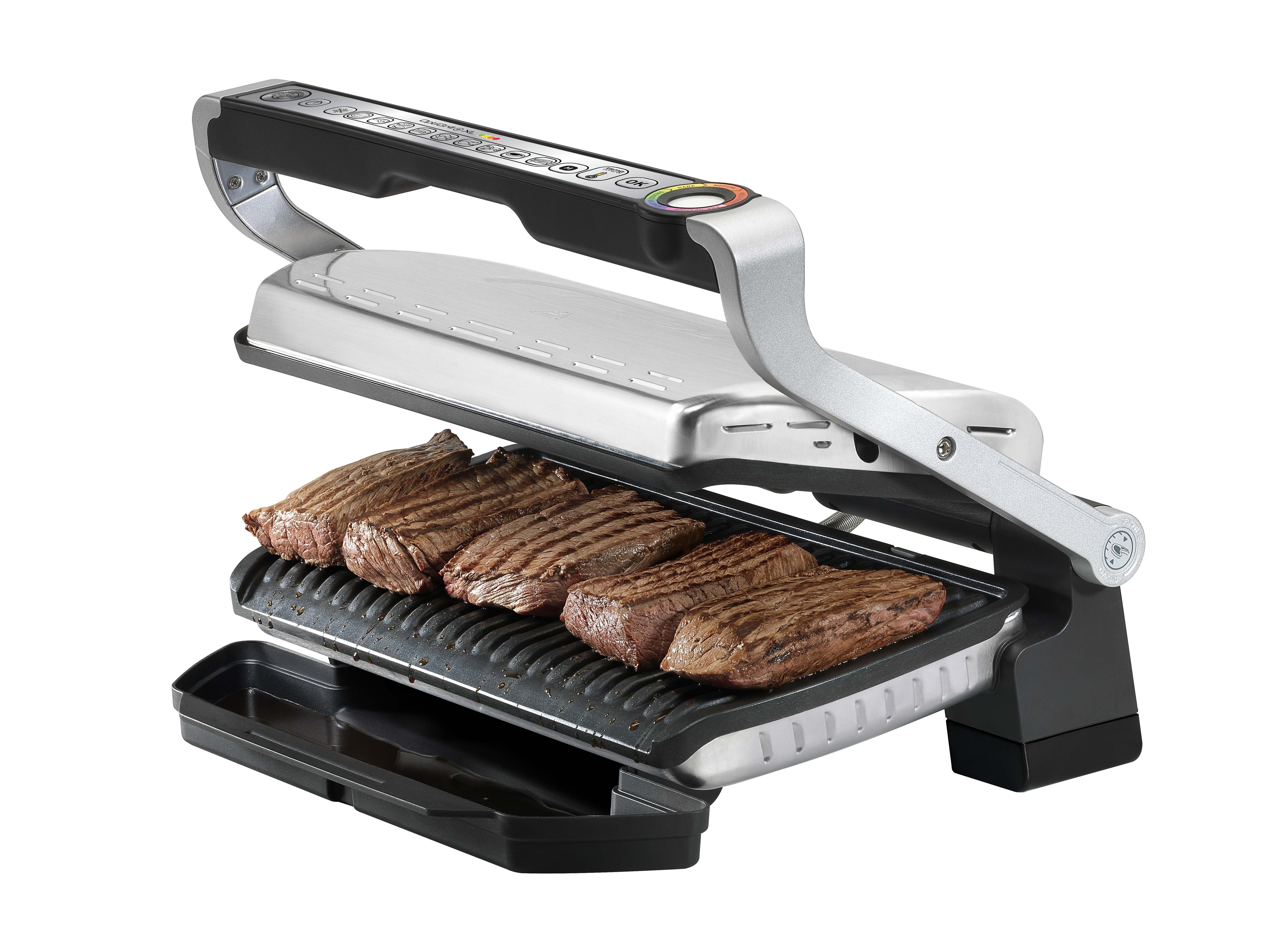 Grill met steaks. Open, met gegrilde steaks op de grill. Zwart en zilver design. Geïsoleerd op witte achtergrond.