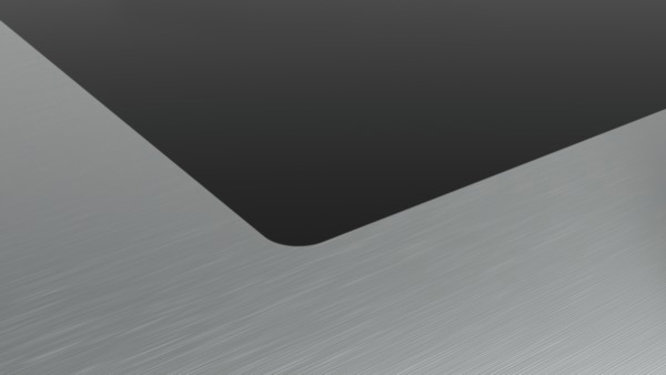 Ein abstrakter, geometrischer Hintergrund in Grau und Schwarz.