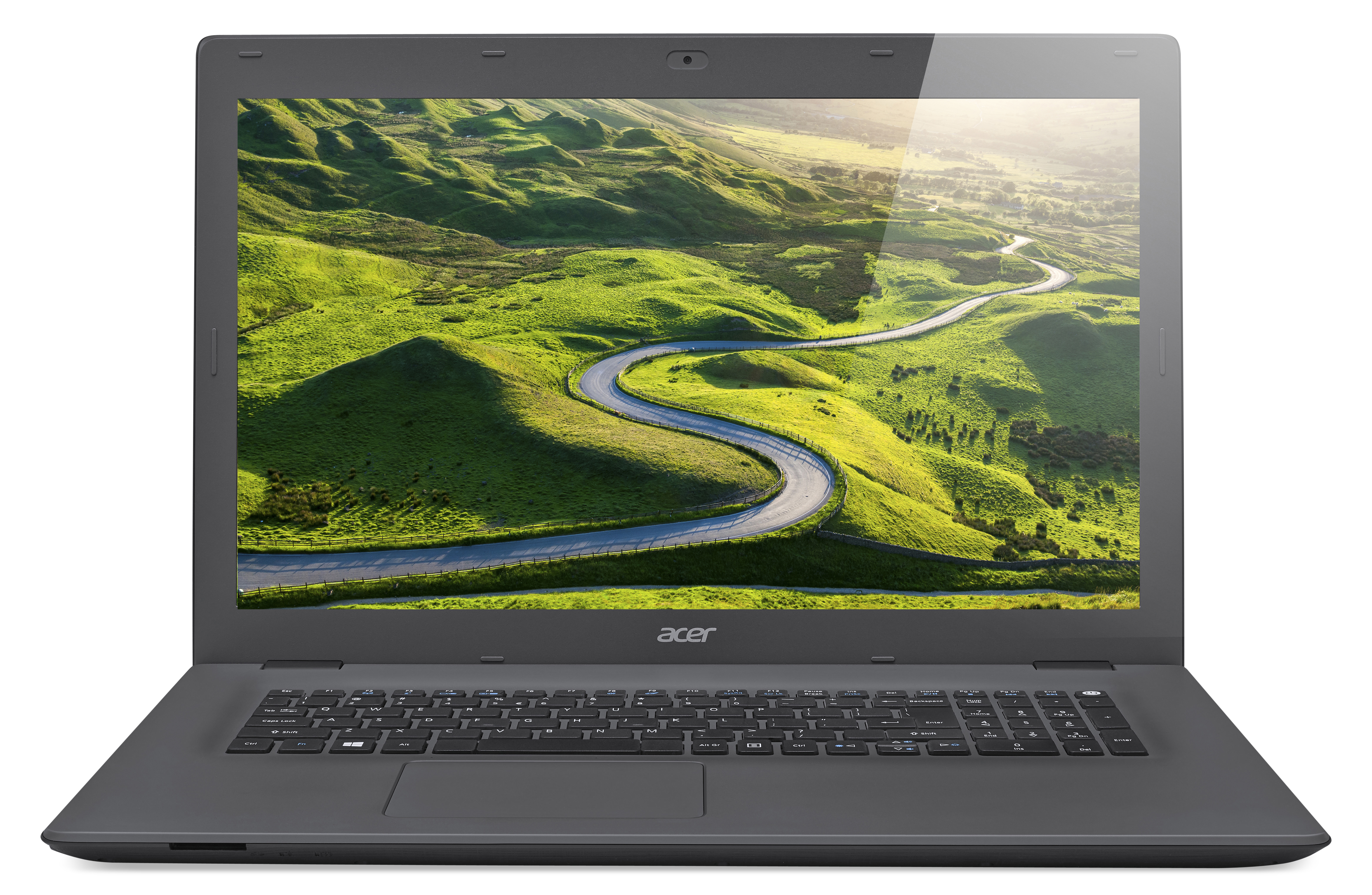 Laptop mit grüner Landschaft auf dem Bildschirm mit einer kurvenreichen Straße.