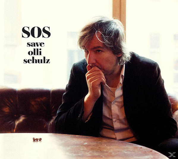 Albumcover. Ein Mann im Anzug wirkt nachdenklich, mit Albumtitel und Künstlername.