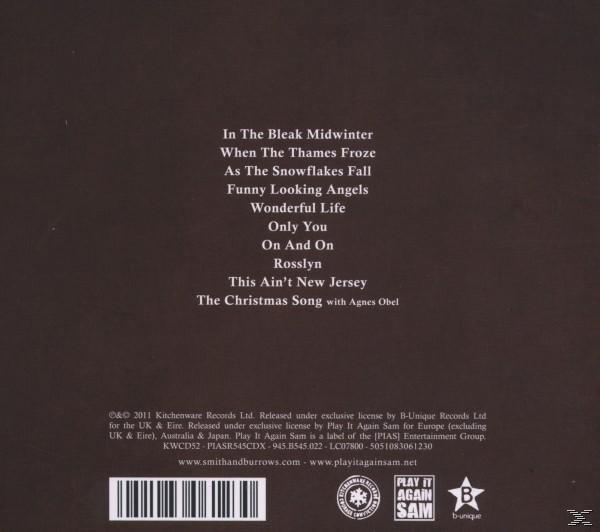 Titelliste auf braunem Hintergrund. Albumtitel und Künstlerinformationen unten.