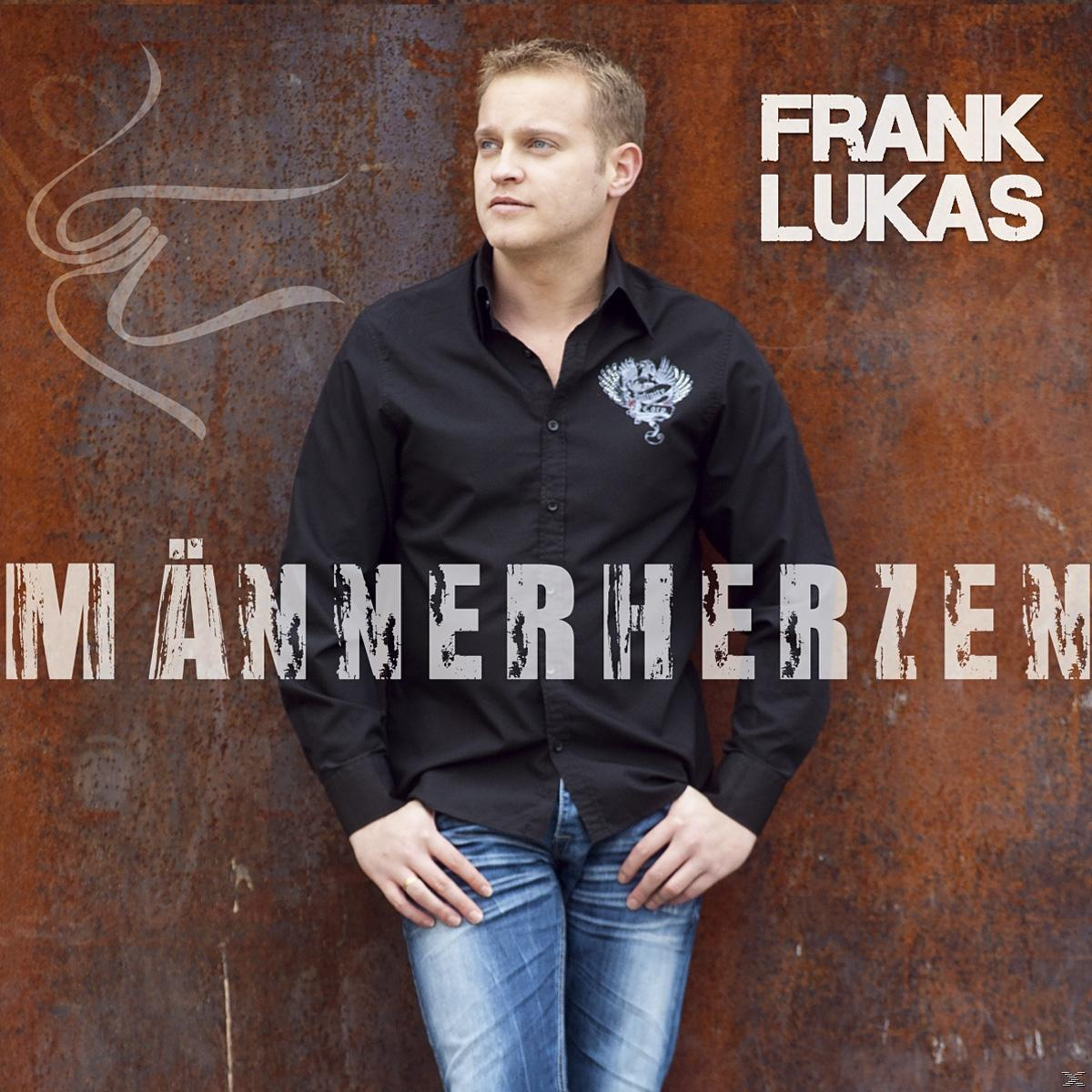 Mann steht vor einer rostigen Wand, Albumcover. Text lautet „Männerherzen“ & „Frank Lukas“.