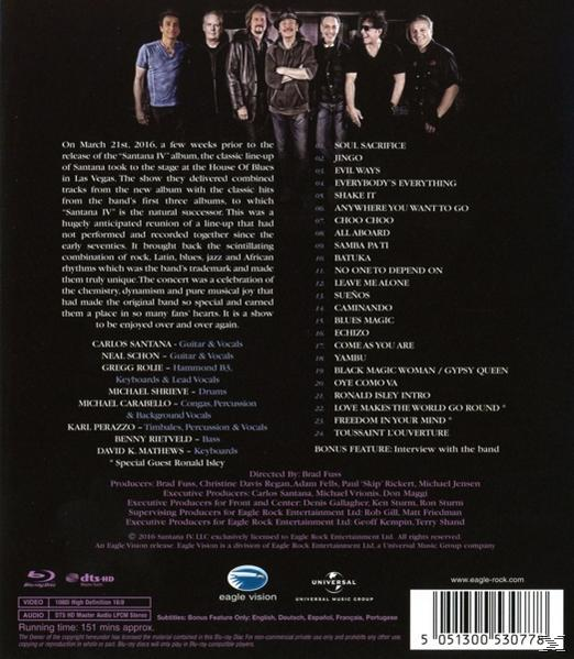 DVD-Rückseite mit Bandfoto, Trackliste und Credits, vor dunklem Hintergrund.