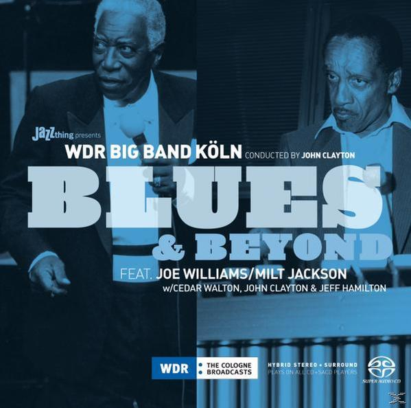Jazz-Albumcover mit zwei Männern in Anzügen und dem Wort 'Blues'.