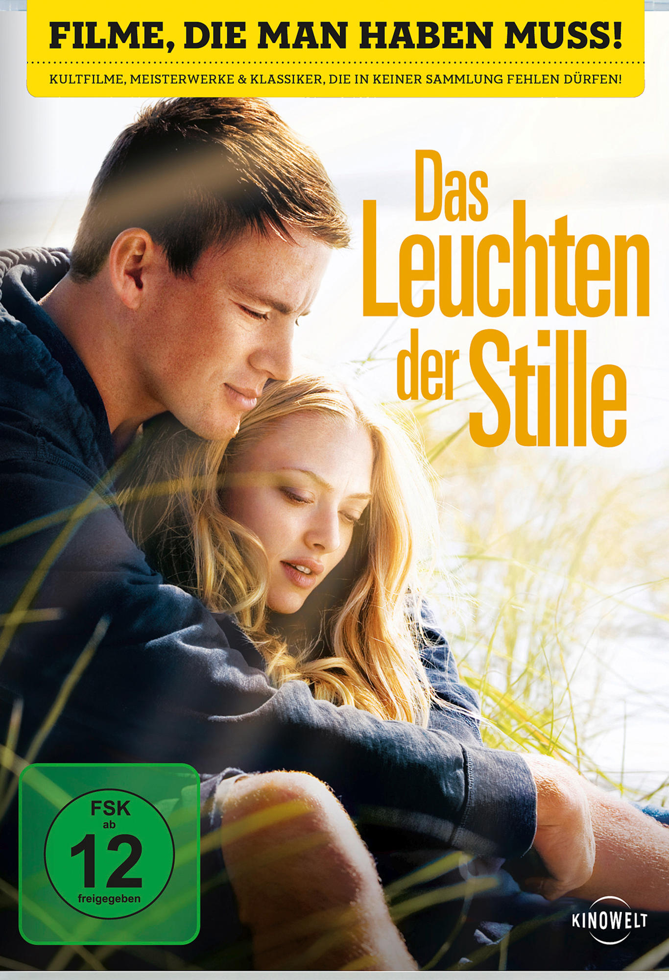 Filmposter mit einem sich umarmenden Paar, Titel in Gold: Das Leuchten der Stille.