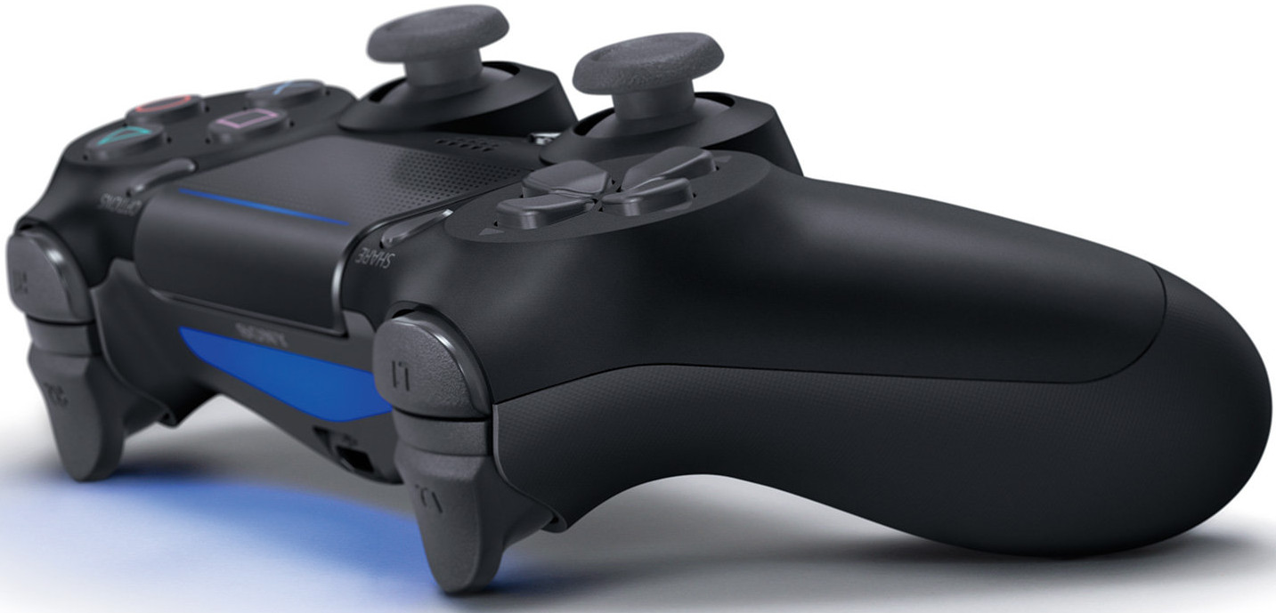 Black PlayStation 4 controller. Top view, buttons visible.