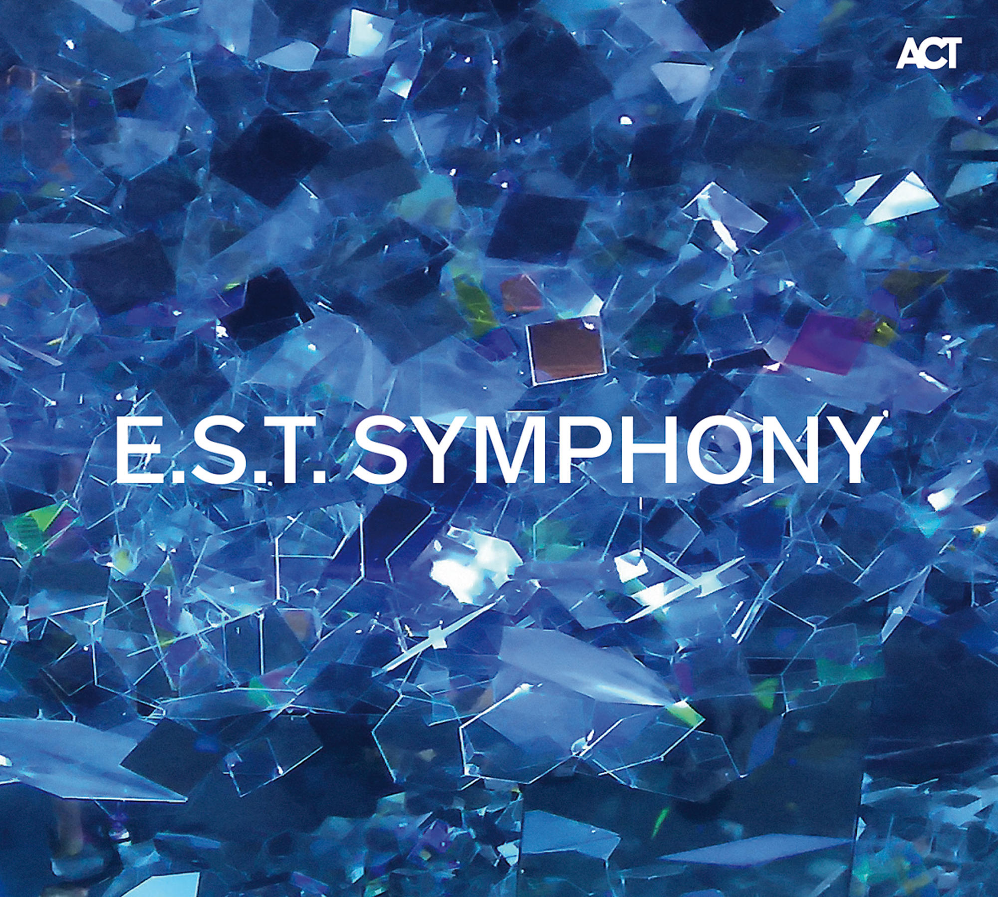 Albumcover mit dem Text E.S.T. SYMPHONY über einem blauen geometrischen Muster.