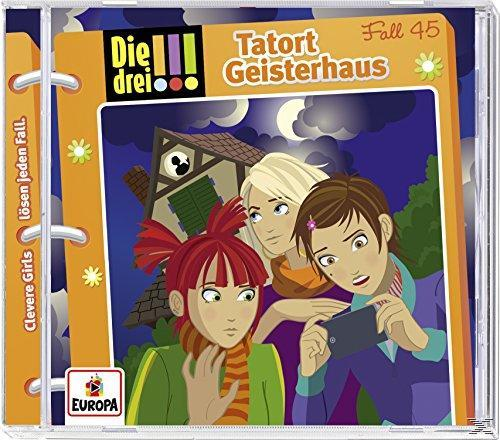 DVD-Hülle, Die drei, Tatort Geisterhaus. Drei Mädchen schauen auf ein Telefon.