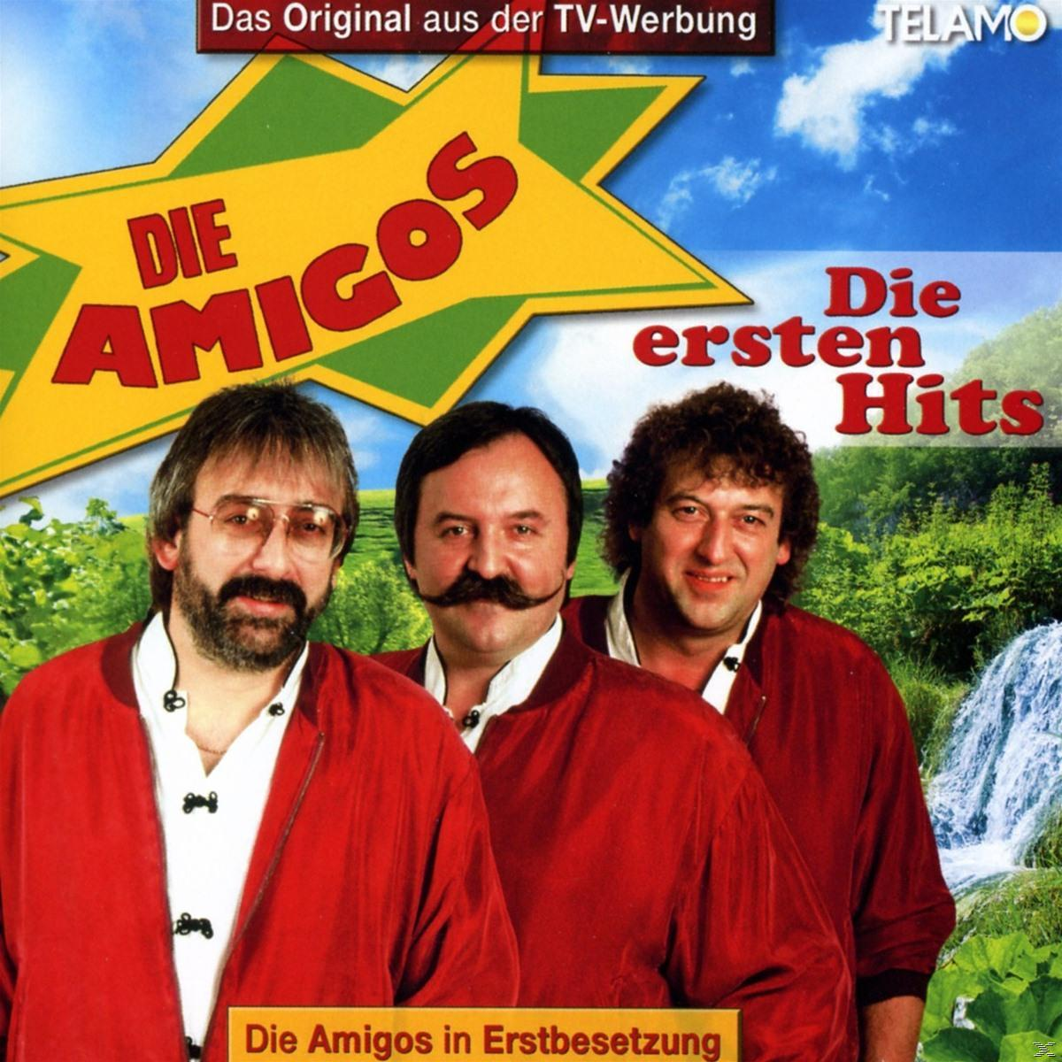 CD-Cover: Drei Männer, rote Jacken, Text 'Die Amigos'.