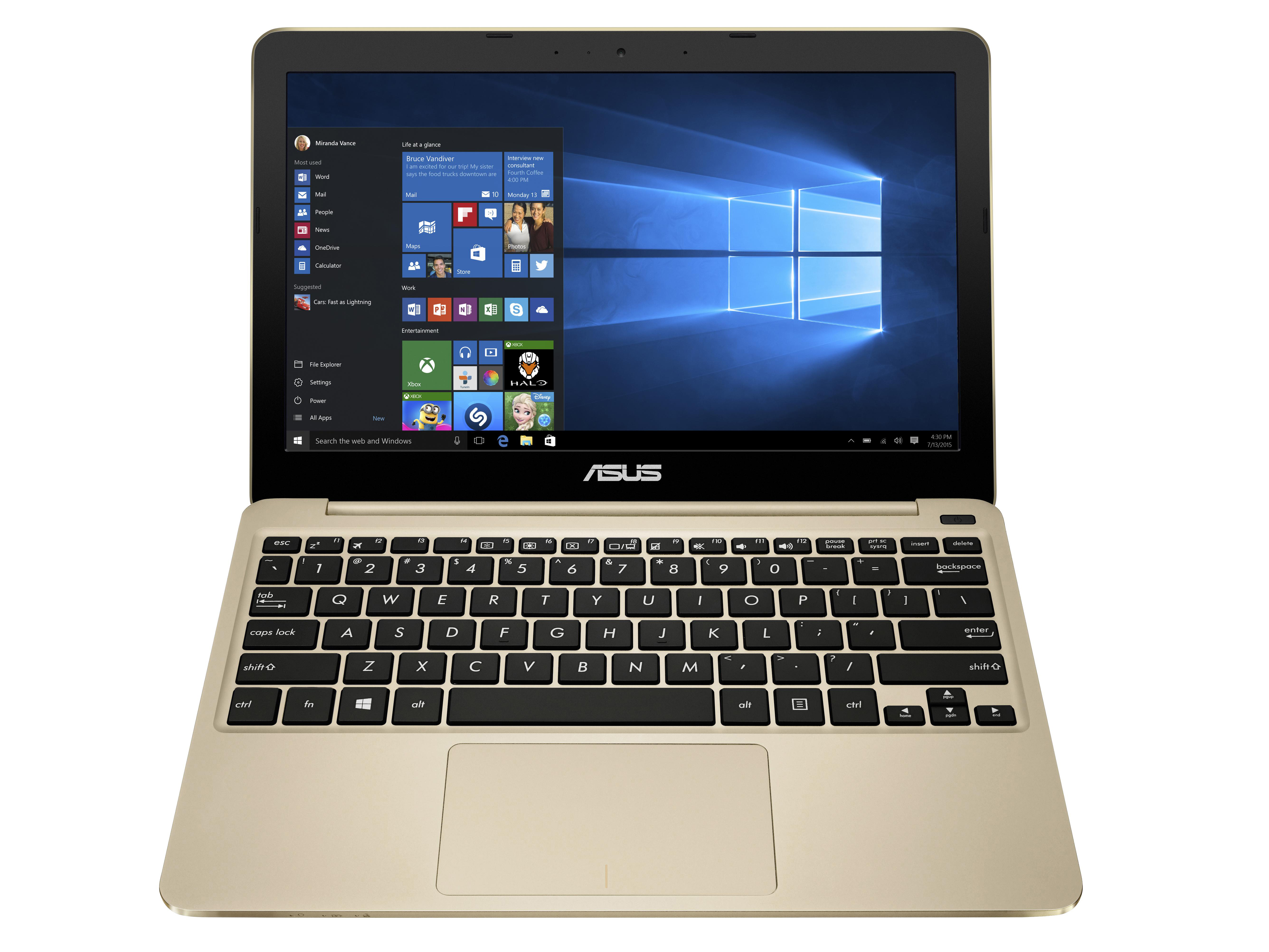 Ein goldener Asus-Laptop mit geöffnetem Bildschirm zeigt den Windows 10 Startbildschirm.