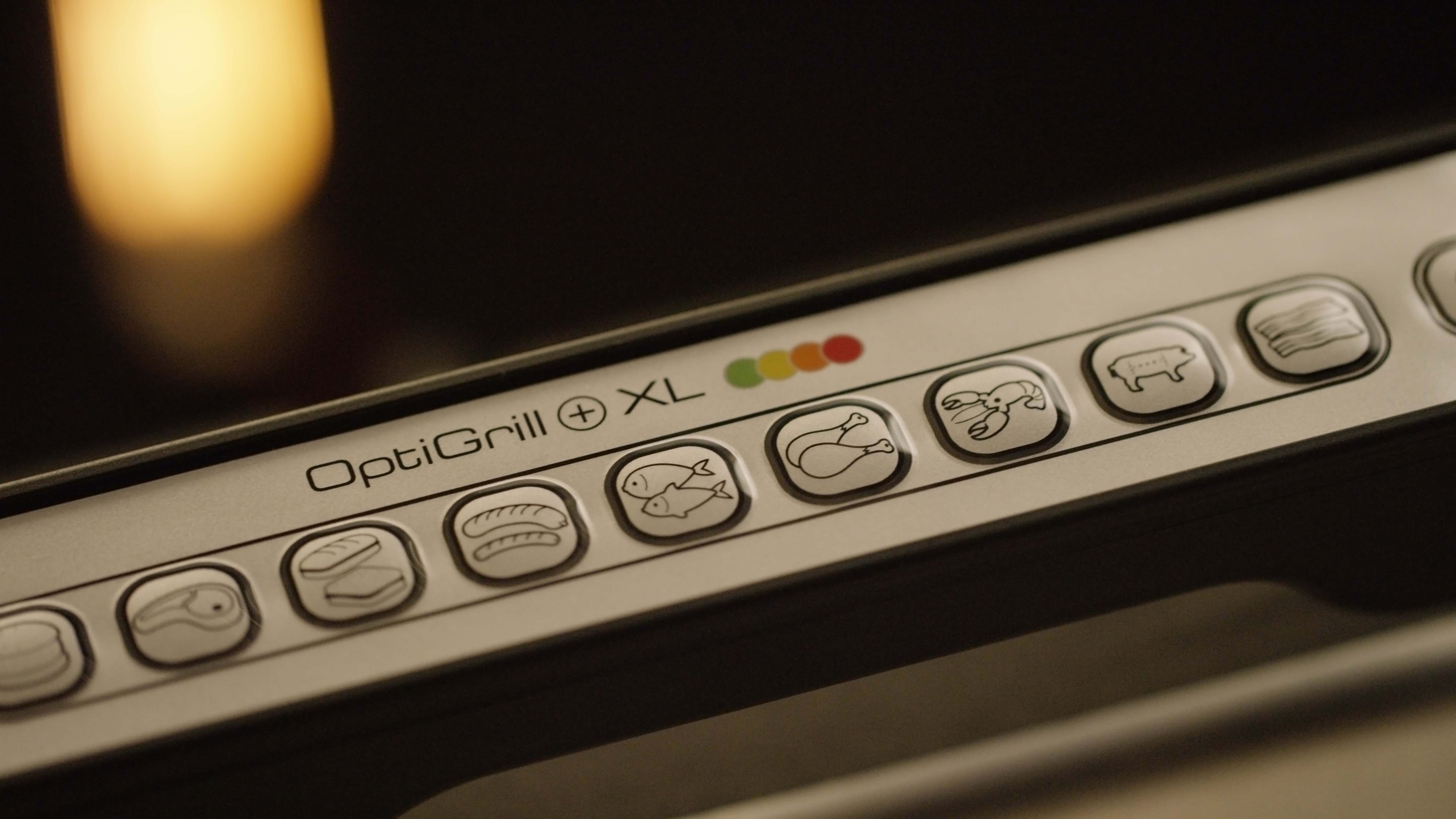 OptiGrill XL bedieningspaneel met iconen voor het koken van verschillende voedingsmiddelen, waaronder vlees, vis en gevogelte.