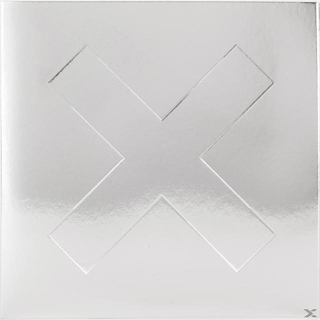 Silbernes Albumcover mit einem geprägten X-Symbol.