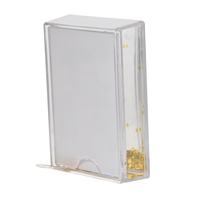 Transparenter Kunststoffrahmen mit weißem Rücken und goldenem Glitzer im Inneren.