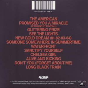 CD back cover with a list of song titles. The background is dark red.