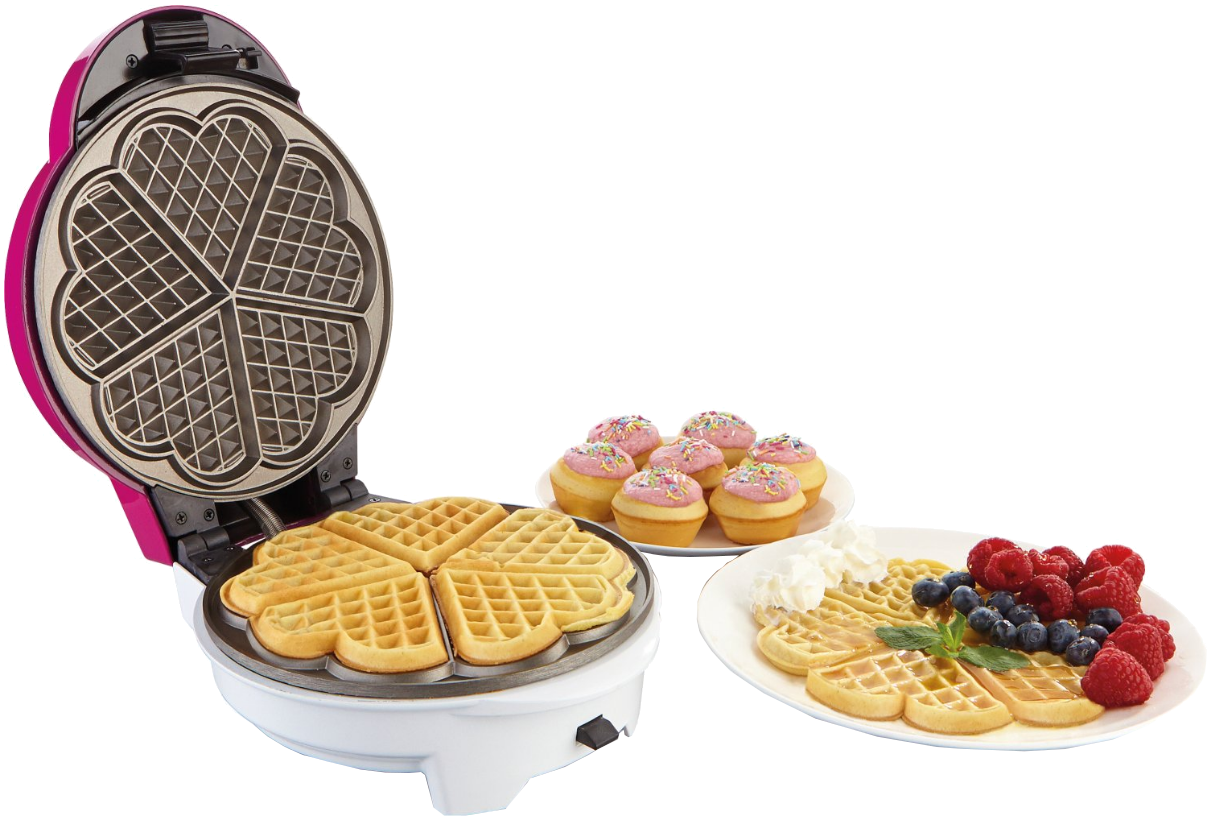 Gofri sütő gofrikkal. Tányér gofrival, muffinokkal és bogyókkal.