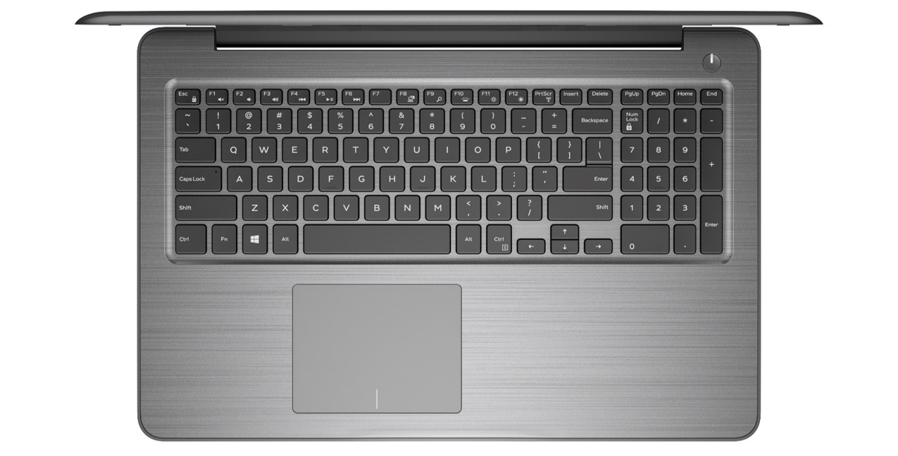Bir dizüstü bilgisayar klavyesi yukarıdan görünüşü. Gümüş renginde ve altta bir dokunmatik yüzeyi var.