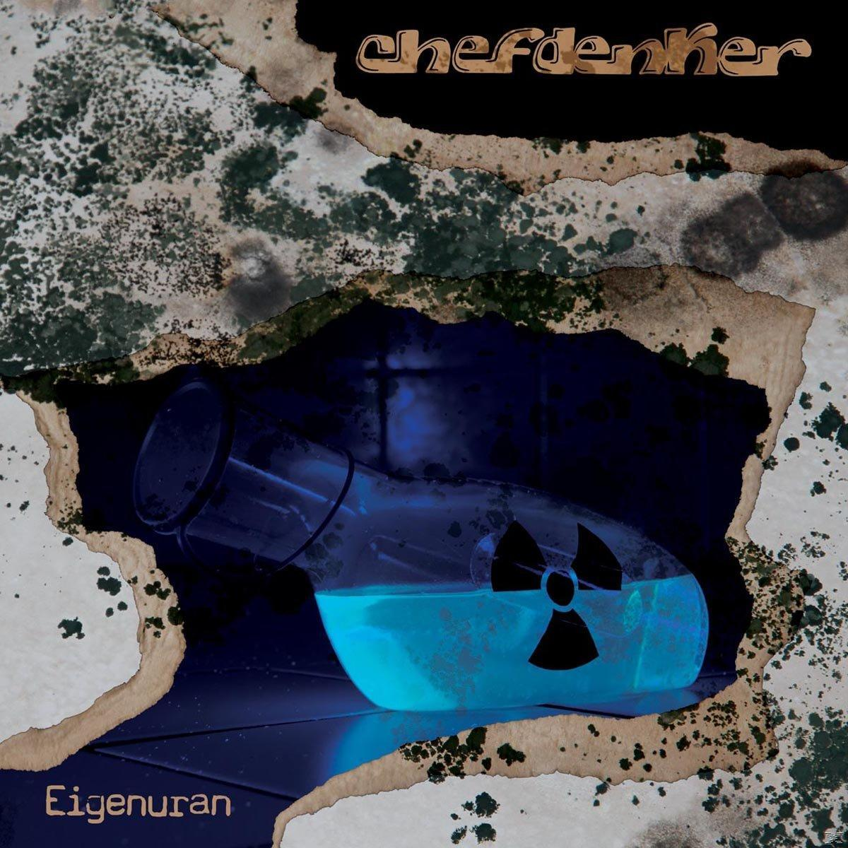 Albumcover mit zerbrochener Wand und Becher mit blauer Flüssigkeit. Der Künstler ist 'chefdenker'.