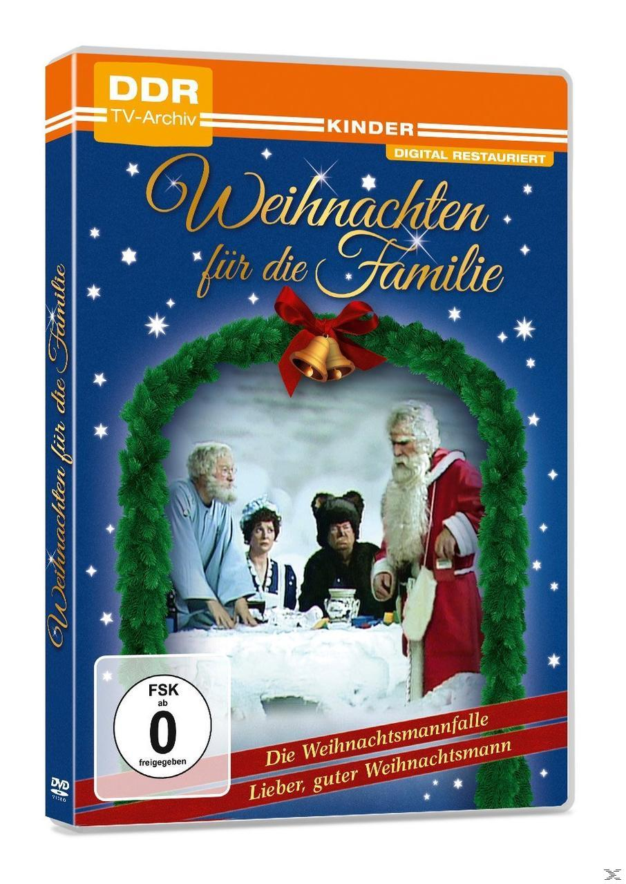 DVD-Hülle eines Weihnachtsfilms mit Weihnachtsmann und anderen Figuren am Tisch.