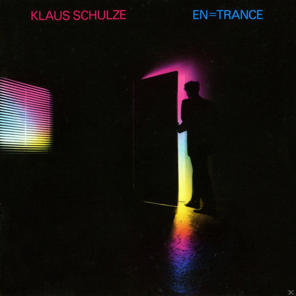 Albumcover: Klaus Schulze - En=Trance. Personensilhouette an einer neonbeleuchteten Tür.