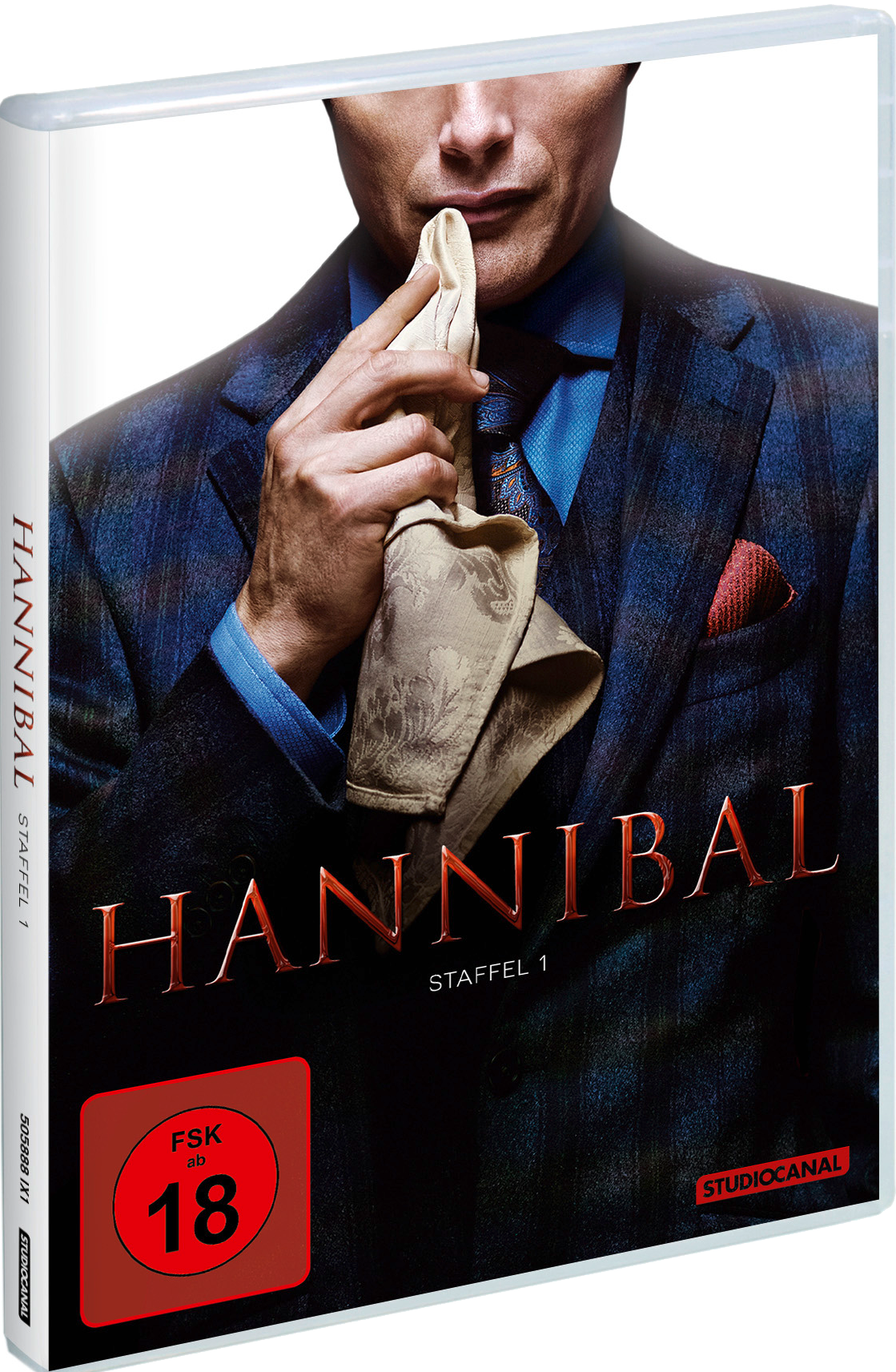 DVD-Hülle: Mann im Anzug hält ein Tuch. Titel 'Hannibal' und 'FSK ab 18' sind sichtbar. Hintergrund ist dunkel und verschwommen.