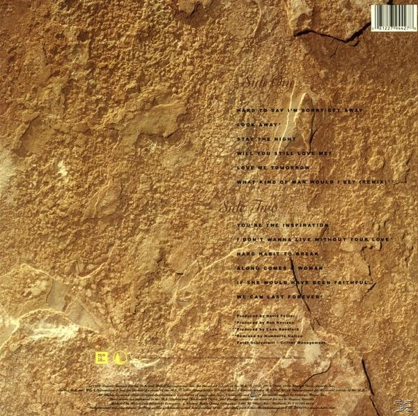 Rückseite eines Albums mit Titelliste und Produktionsdetails auf strukturiertem Hintergrund.