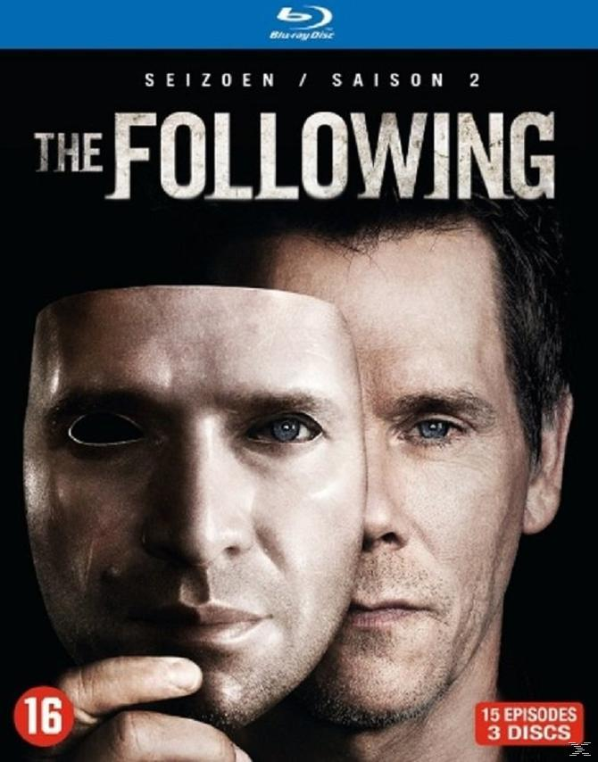 Couverture DVD de la saison 2 de 'The Following'. Présente un homme avec un masque et un visage.