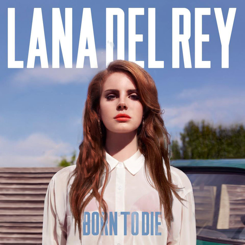 Pochette d'album : Lana Del Rey, aux longs cheveux bruns et aux lèvres rouges, regarde la caméra.