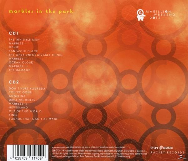 CD-Cover mit orangefarbenem Hintergrund und Kreismuster. Der Text listet die Songtitel der CD auf.