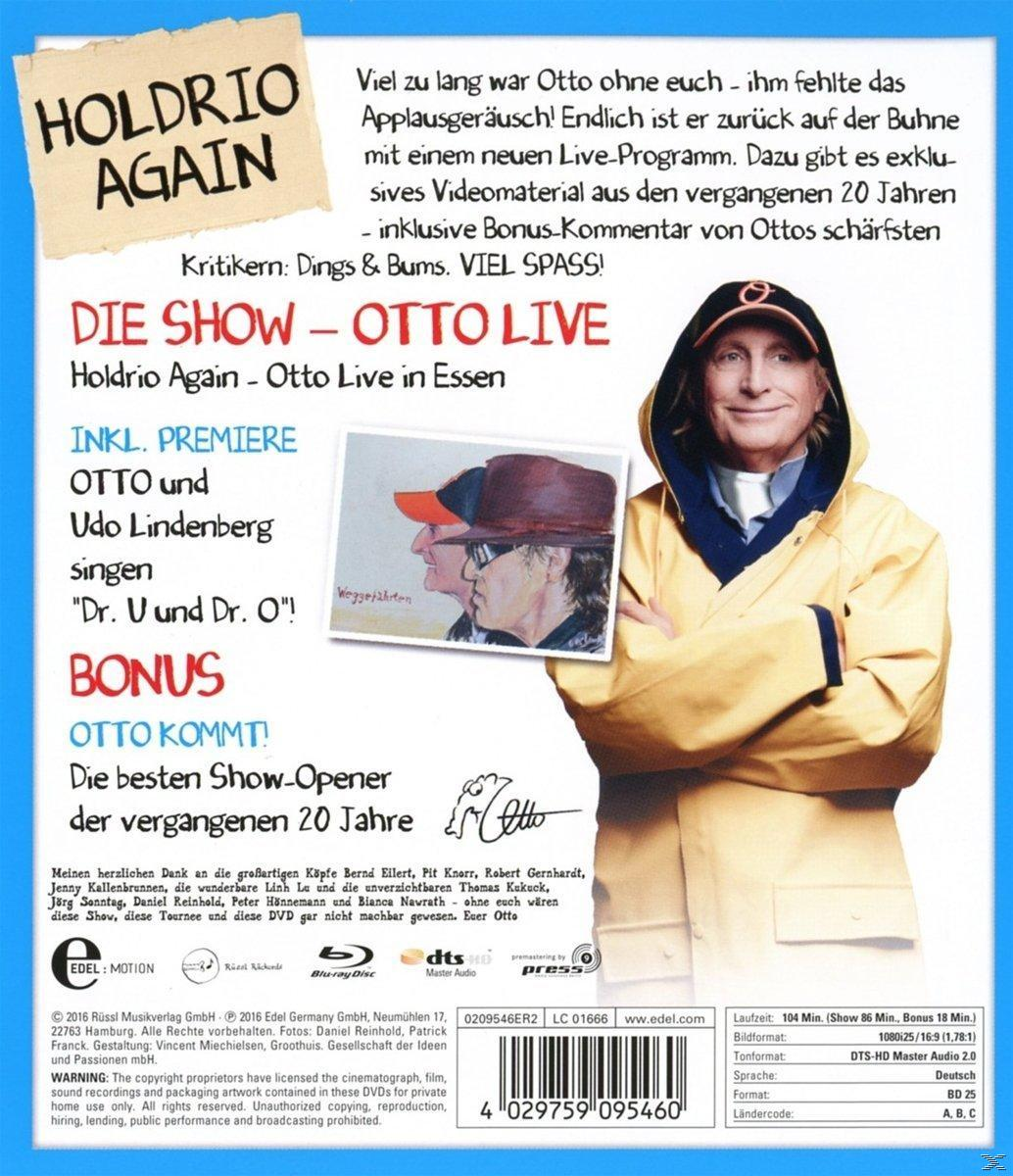 DVD-Hülle von Ottos Show. Otto in gelbem Mantel rechts. Rückseitentext.