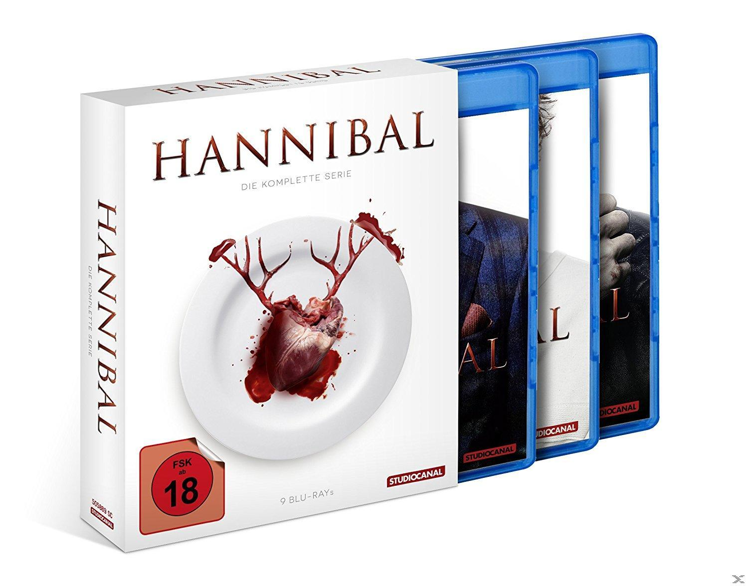 Hannibal Blu-ray-Set. Das Cover zeigt einen Teller mit einem Herzen und Geweih. Drei blaue Hüllen rechts. FSK 18.