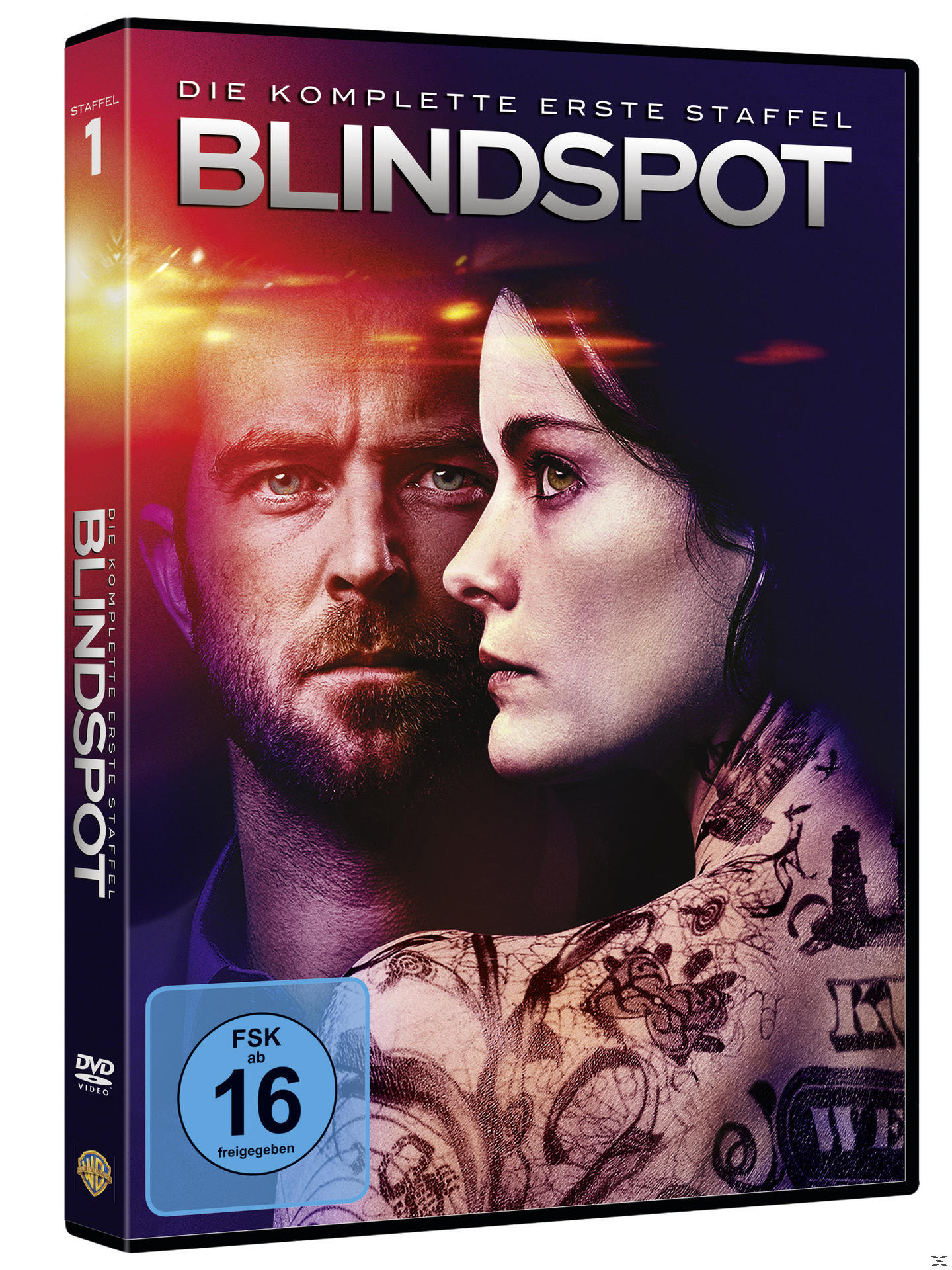 Blindspot DVD-Cover. Zeigt einen Mann und eine Frau mit Tätowierungen. Dunkler Hintergrund.