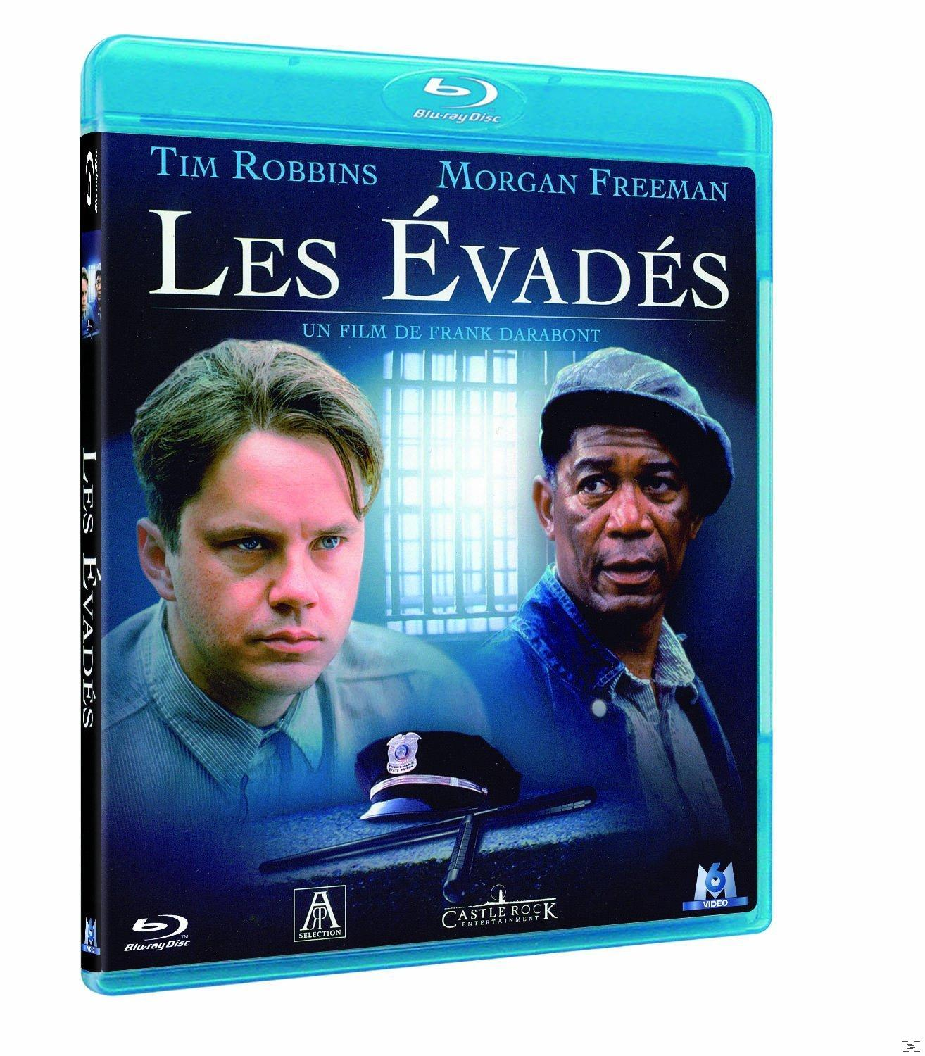 Couverture du film 'Les Évadés' avec deux hommes en tenue de prison, l'un avec un chapeau et l'autre regardant la caméra.