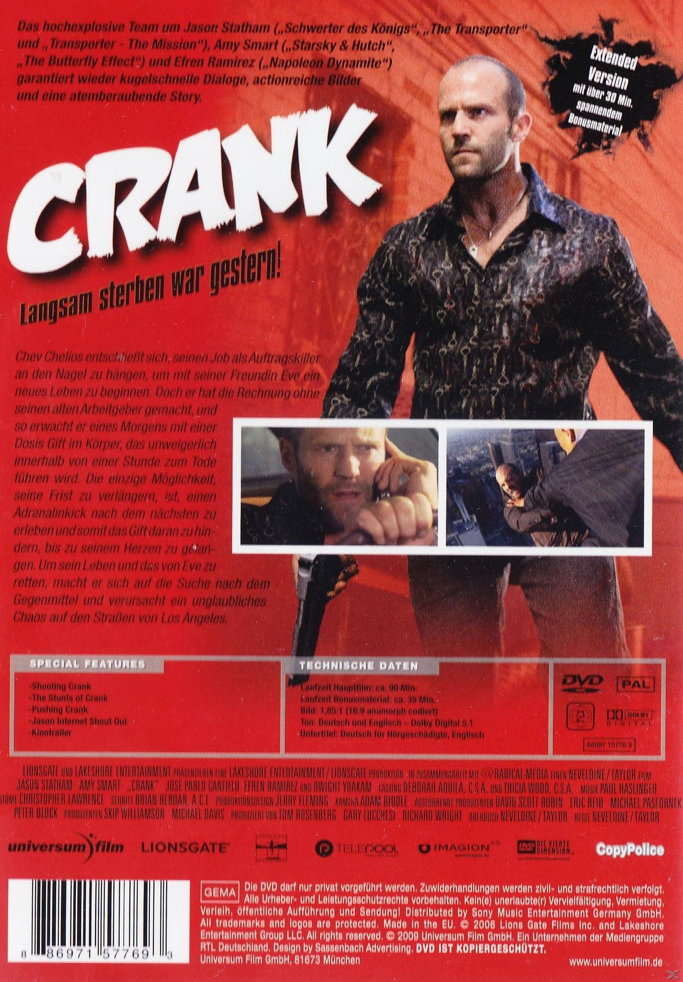 DVD-Cover mit einem Mann, der eine Waffe hält, Text auf der Vorderseite und einer Stadtlandschaft im Hintergrund.