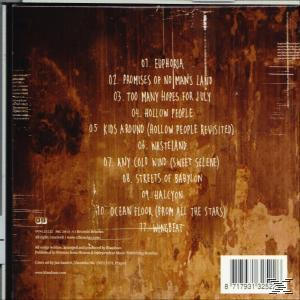 Dos du boîtier CD avec liste des pistes. Fond marron. Noms des pistes en texte blanc.
