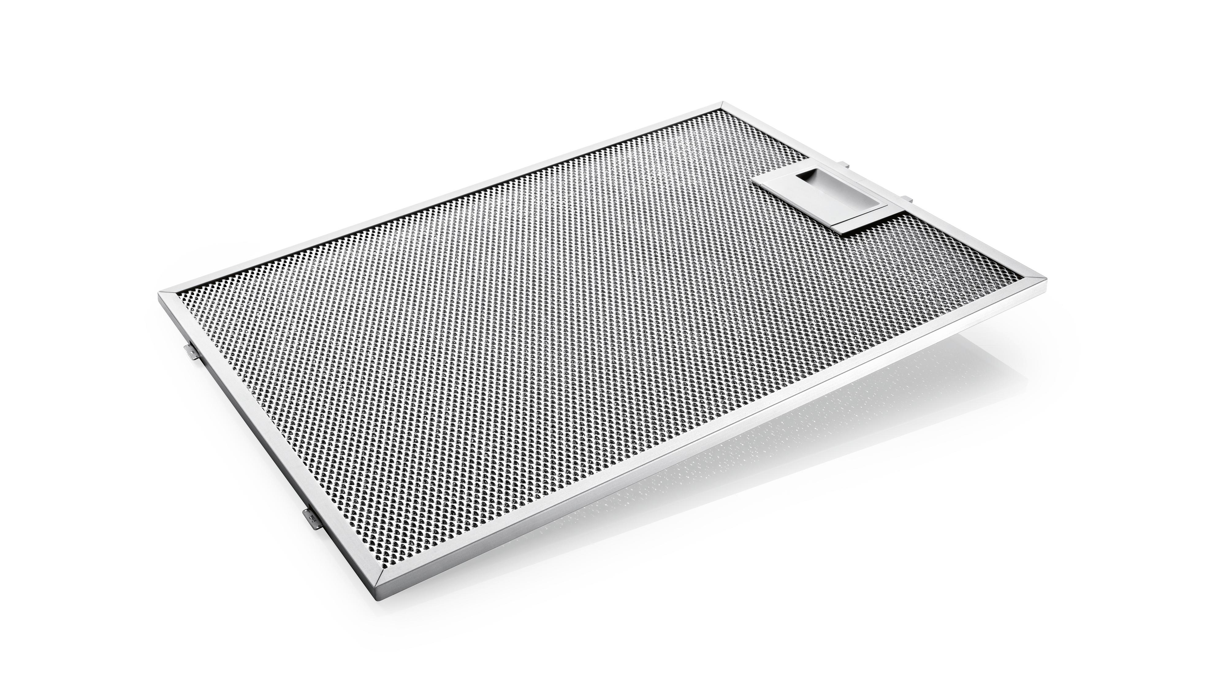 A stainless steel range hood filter with a perforated surface.