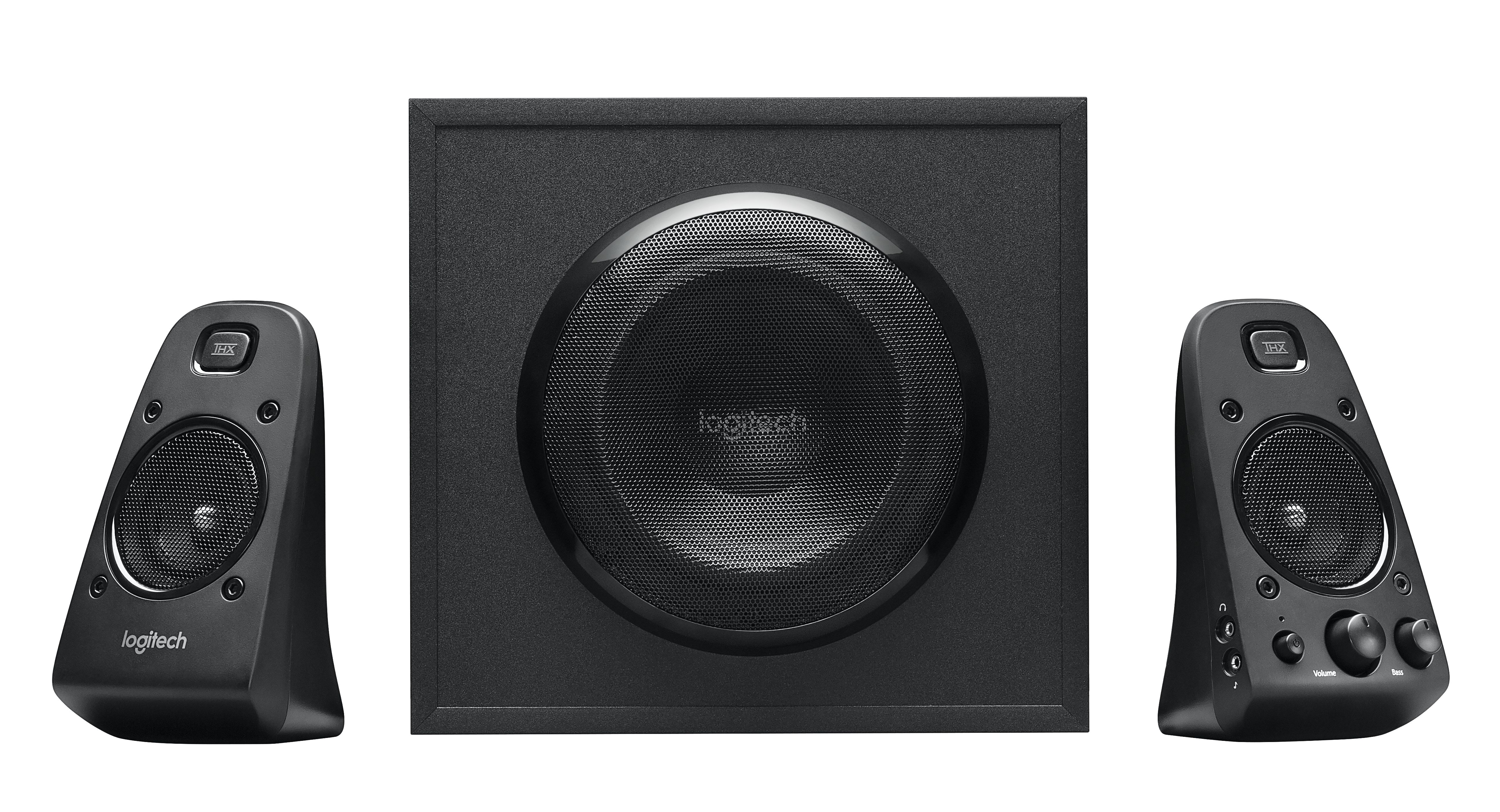 Black Logitech speaker system. One subwoofer and two satellite speakers. White background.